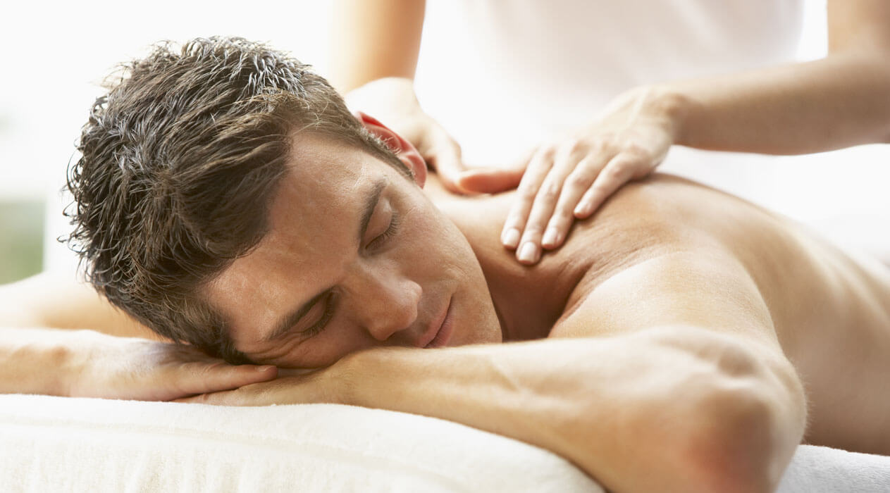 Man Getting Massage at Spa
